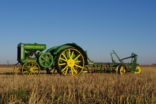 Green yellow tractor wheat field free wallpaper - medium preview image