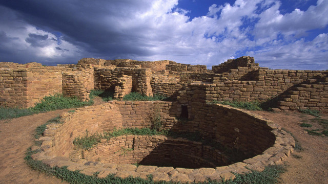 Stone building hole cloudy sky free wallpaper - medium preview image