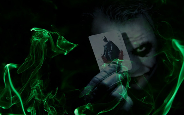 Joker holding card green smoke free wallpaper - medium preview image