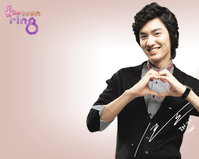 Man holding item smiling pink free wallpaper - medium preview image