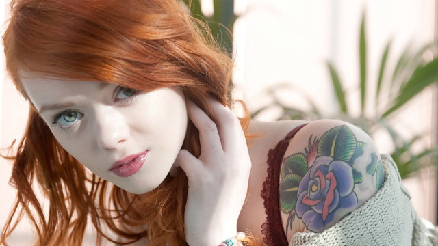Red hair tattoos woman arm free wallpaper - medium preview image