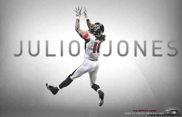 Football player jumping hands up free wallpaper - medium preview image