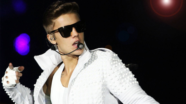 Man white jacket sunglasses microphone free wallpaper - medium preview image