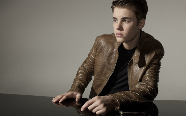 Man sitting table brown jacket #2 free wallpaper - medium preview image