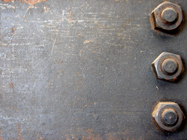 Metal plate four nuts rusted free wallpaper - medium preview image