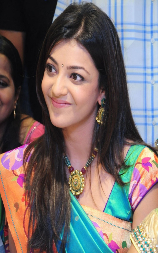 Woman colorful sari smiling camera free wallpaper - medium preview image
