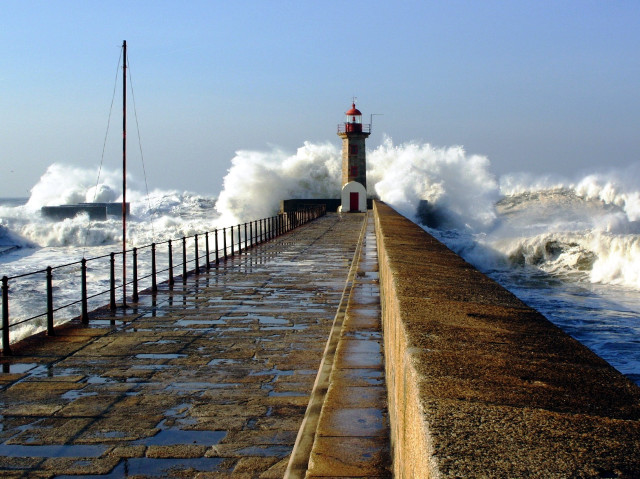 Lighthouse waves pier fence stormy free wallpaper - medium preview image