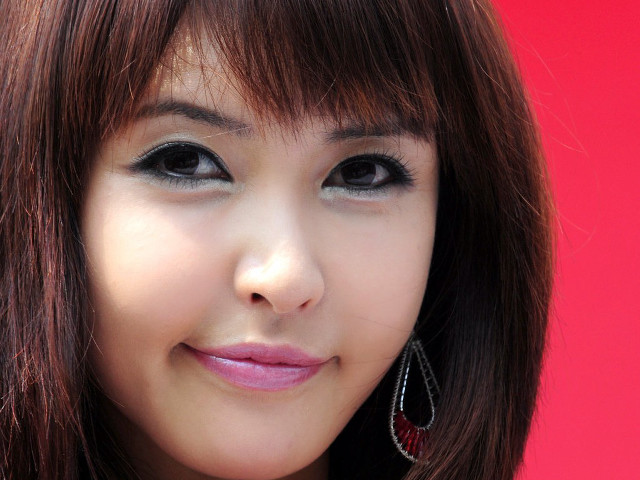 Woman red shirt earrings red free wallpaper - medium preview image