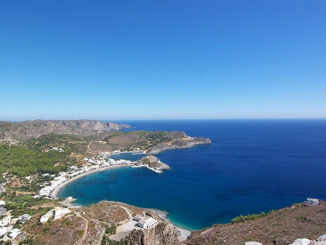 Beach water view hilltop scenery free wallpaper - medium preview image