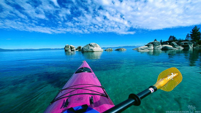 Kayak rocks trees water rockformation free wallpaper - medium preview image