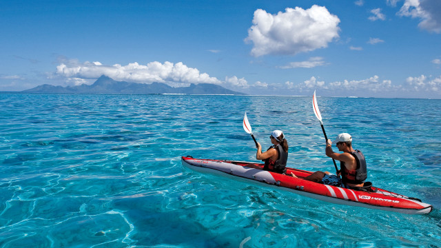 Red kayak ocean mountains blue free wallpaper - medium preview image
