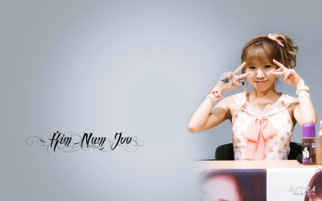 Woman sitting desk bottle wine free wallpaper - medium preview image