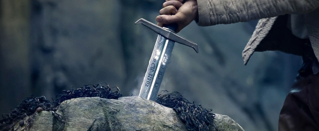 Person holding sword rock mountain free wallpaper - medium preview image
