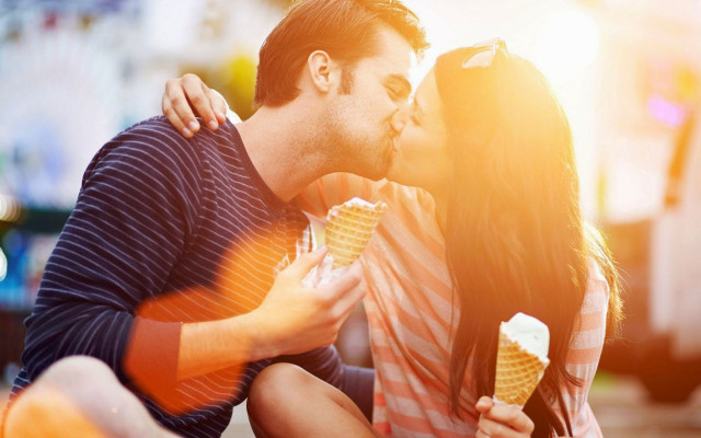 Romantic couple eating icecream city free wallpaper - medium preview image