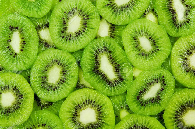 Kiwi fruit close up white free wallpaper - medium preview image