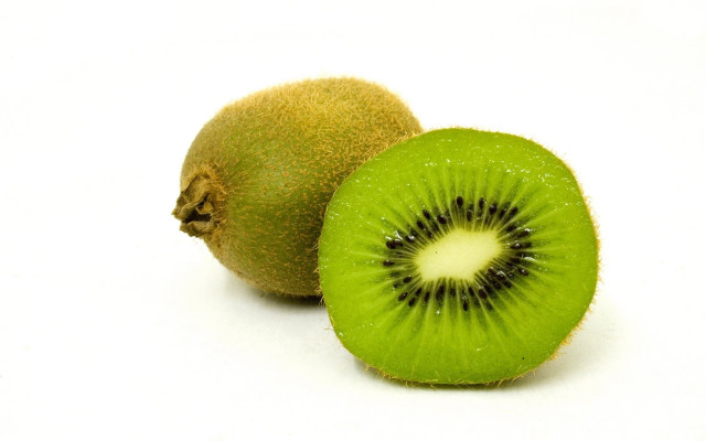 Kiwi fruit cut half white #2 free wallpaper - medium preview image
