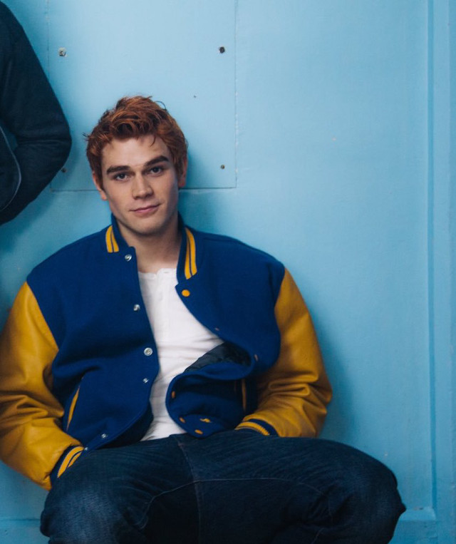 Man sitting blue wall jacket free wallpaper - medium preview image
