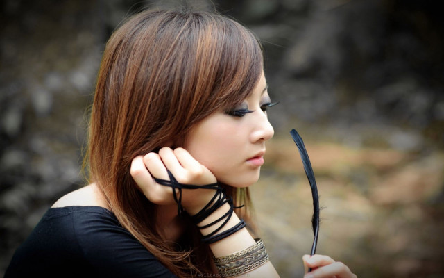 Woman scissors black strap neck free wallpaper - medium preview image