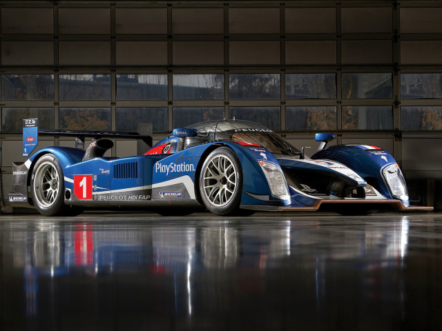 Blue race car building large free wallpaper - medium preview image