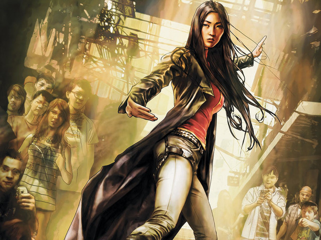 Woman dancing long coat crowd free wallpaper - medium preview image