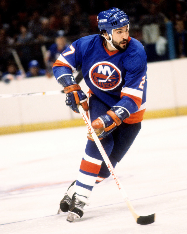 Hockey player ice moving puck free wallpaper - medium preview image
