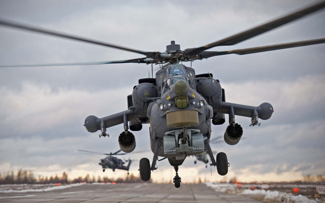 Military helicopter flying low cloudy free wallpaper - medium preview image
