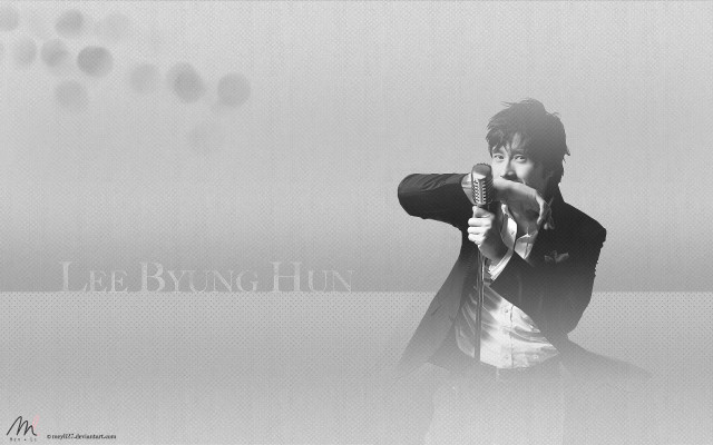 Man gun pointing camera blurry free wallpaper - medium preview image