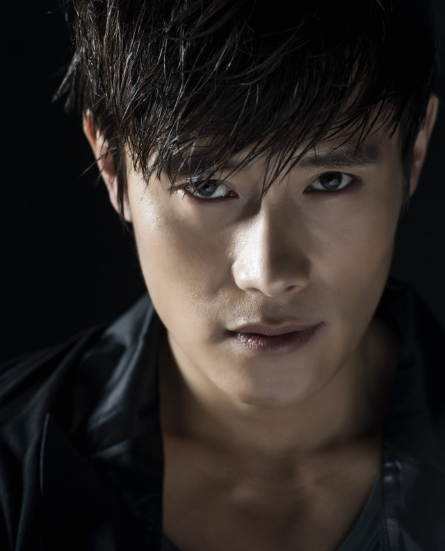 Man black shirt black hair free wallpaper - medium preview image