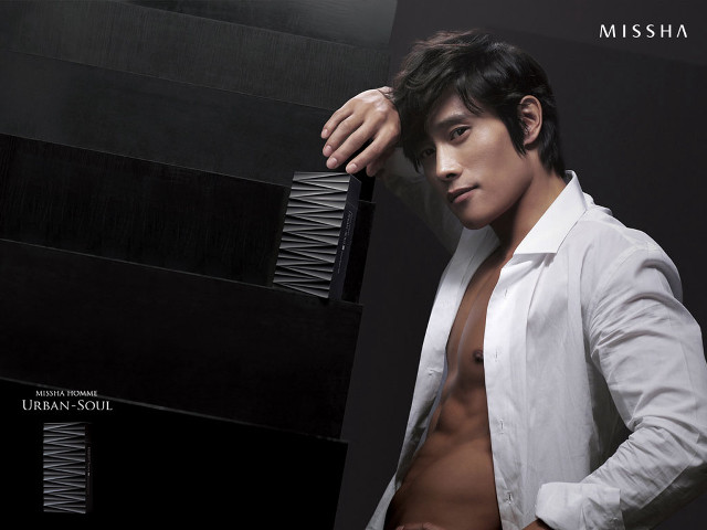 Man leaning wall shirt open free wallpaper - medium preview image