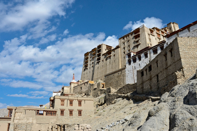 Large building rocky hill sky free wallpaper - medium preview image