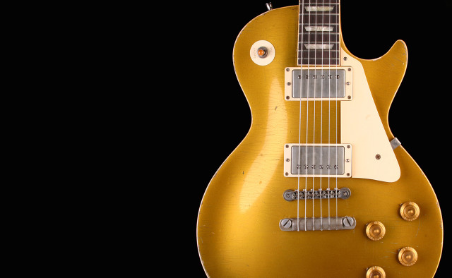 Gold electric guitar black background free wallpaper - medium preview image