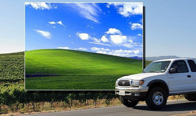 White truck driving green field free wallpaper - medium preview image