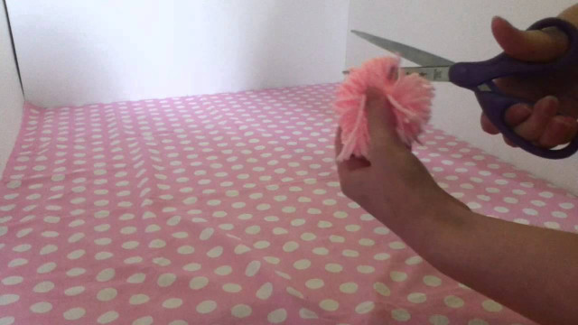 Person cutting pink pom polka free wallpaper - medium preview image