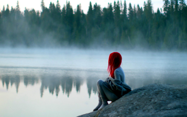 Woman sitting rock lake fog free wallpaper - medium preview image