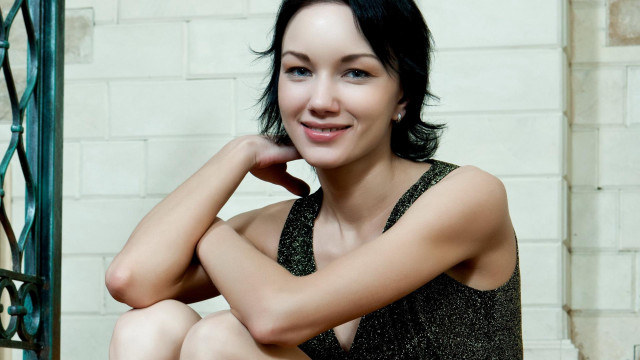 Woman sitting step hand chin free wallpaper - medium preview image