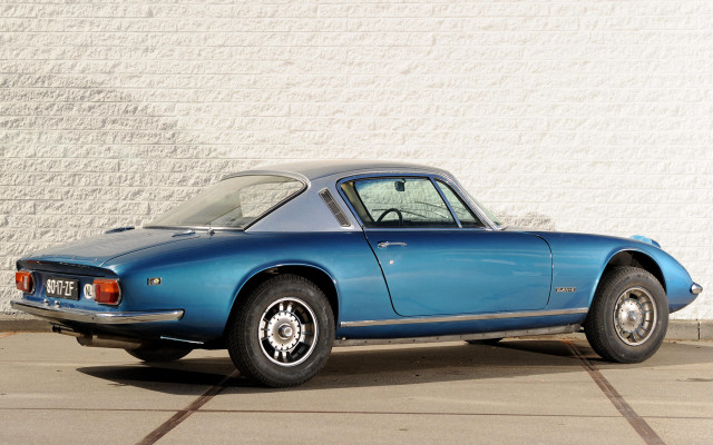 Blue sports car white wall #2 free wallpaper - medium preview image