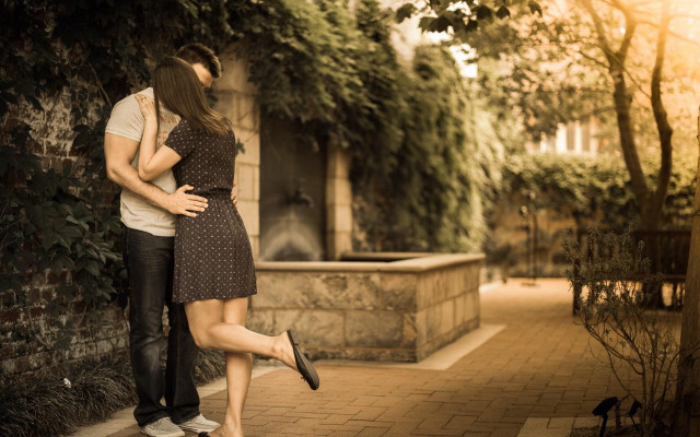 Man woman sidewalk fountain trees free wallpaper - medium preview image