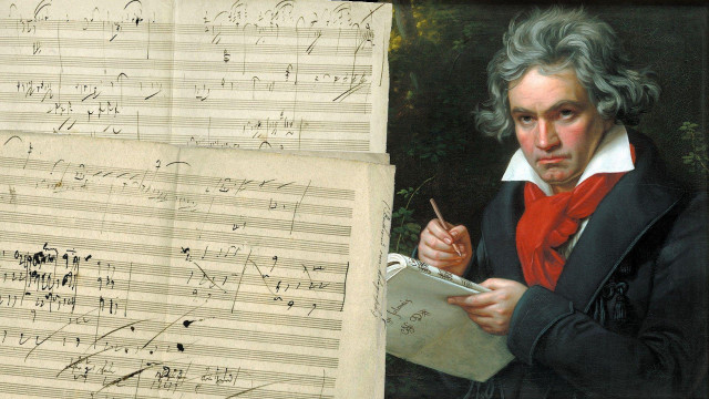 Man holding paper sheet music free wallpaper - medium preview image