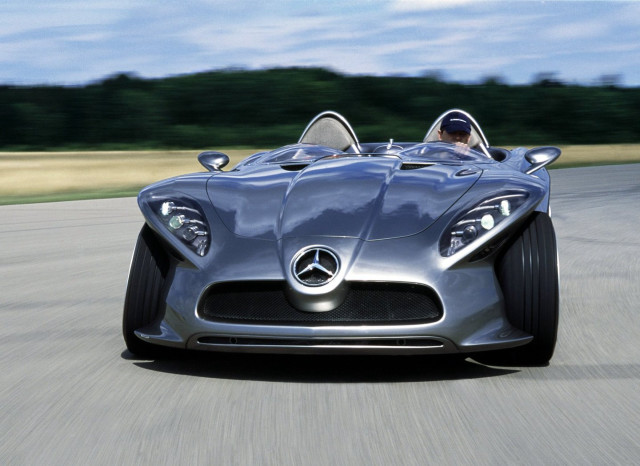 Silver sports car driving forest free wallpaper - medium preview image