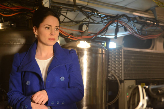 Woman blue coat machine wires free wallpaper - medium preview image