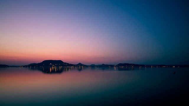 Lake mountain sunset cityscape clouds #2 free wallpaper - medium preview image