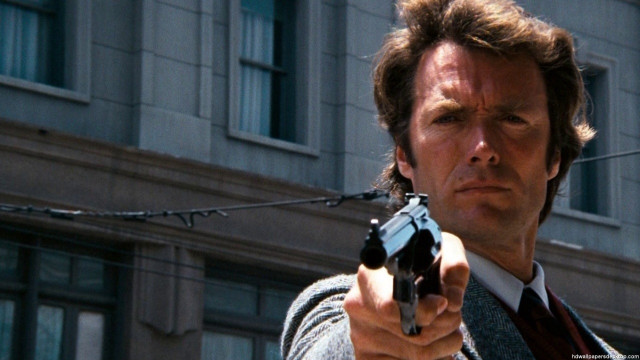 Man holding gun building background free wallpaper - medium preview image