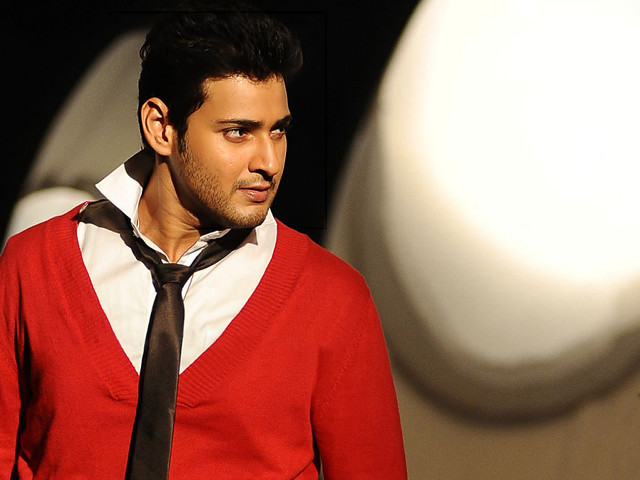 Man red sweater black tie free wallpaper - medium preview image