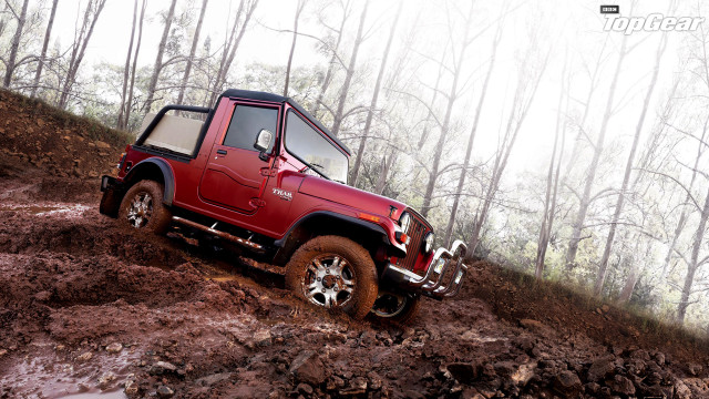 Red jeep muddy hill woods free wallpaper - medium preview image