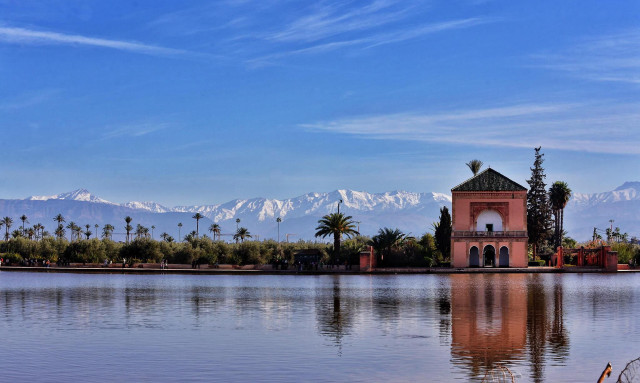 Lake building mountains blue sky free wallpaper for desktop - medium preview image