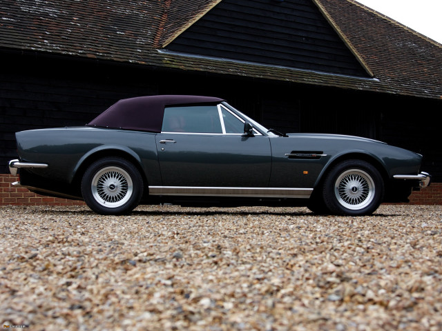 Grey sports car parked building free wallpaper - medium preview image