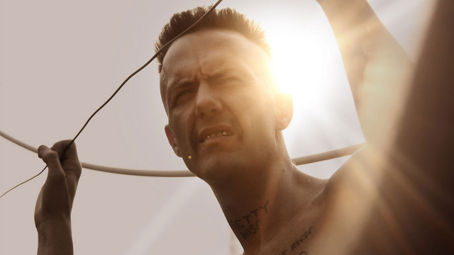 Man holding string smiling right free wallpaper - medium preview image