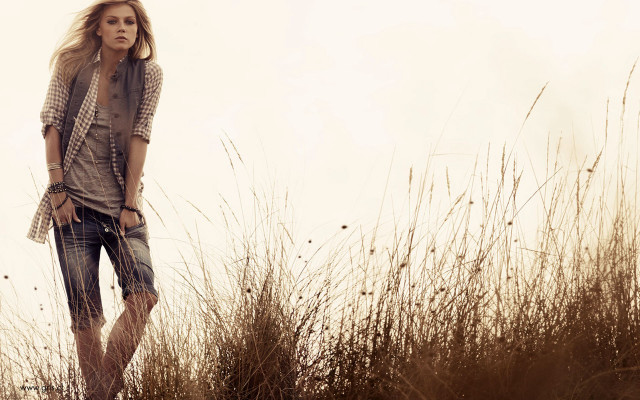 Woman field grass hands pockets free wallpaper - medium preview image