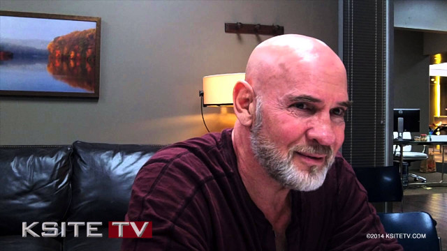 Bald man goatee couch living free wallpaper - medium preview image