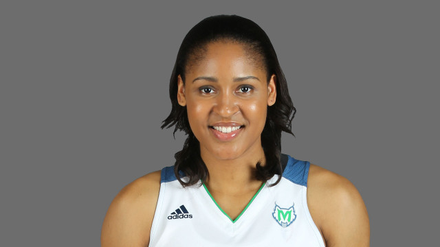Woman smiling basketball uniform green free wallpaper - medium preview image